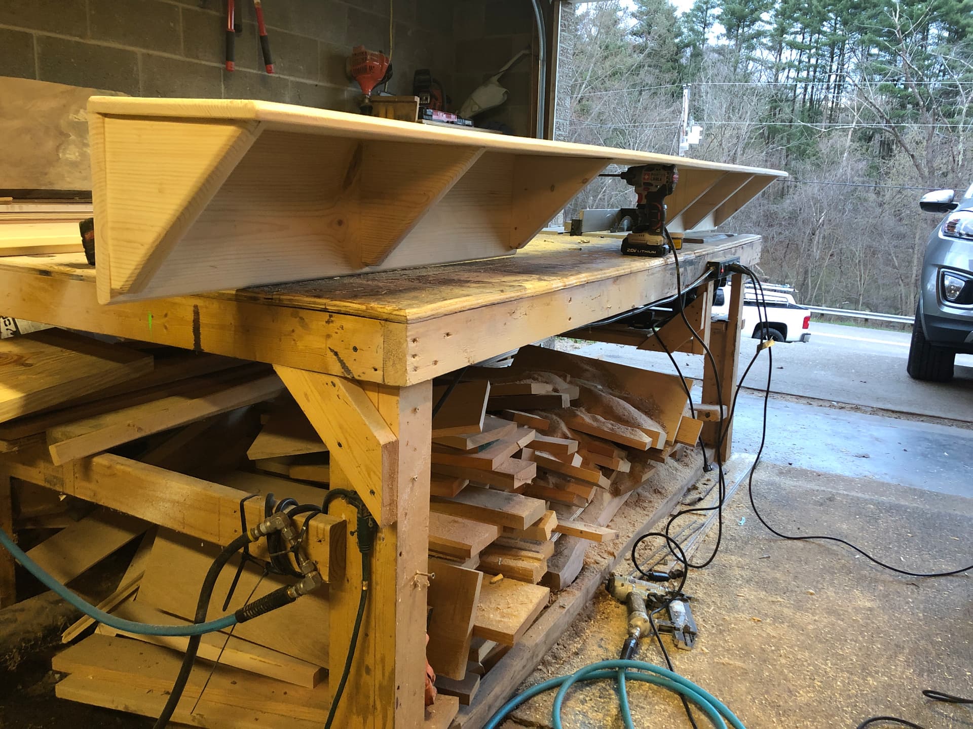 Shop-built stair stringers and treads on the workbench